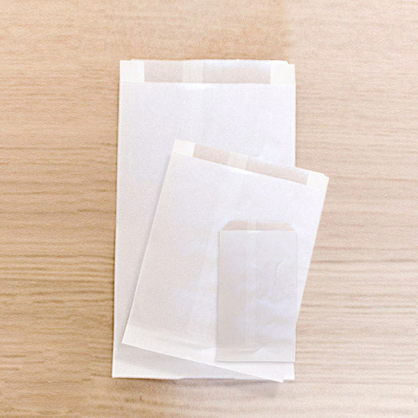 Bolsas de papel blancas pequeñas